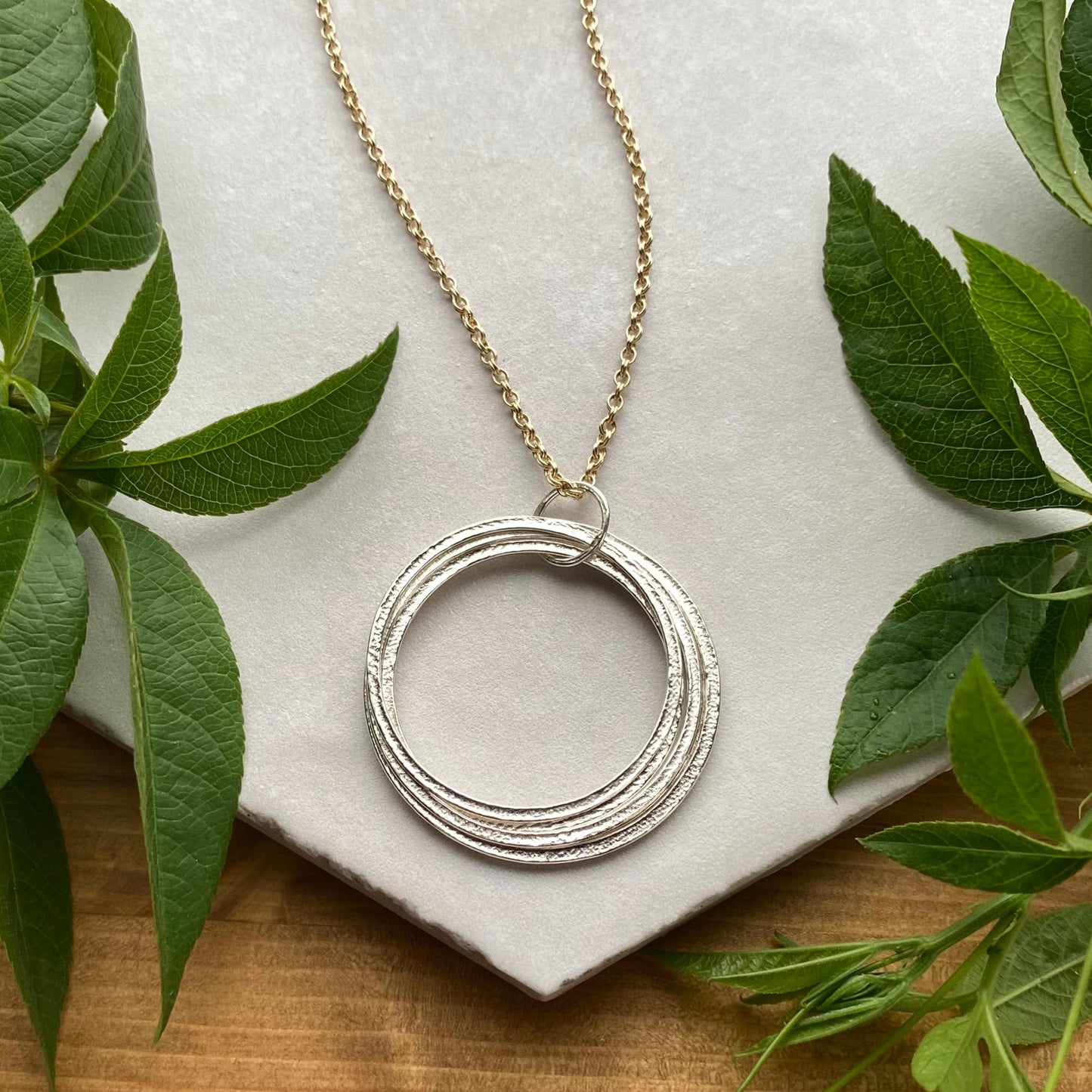 50th mixed metal large circle necklace