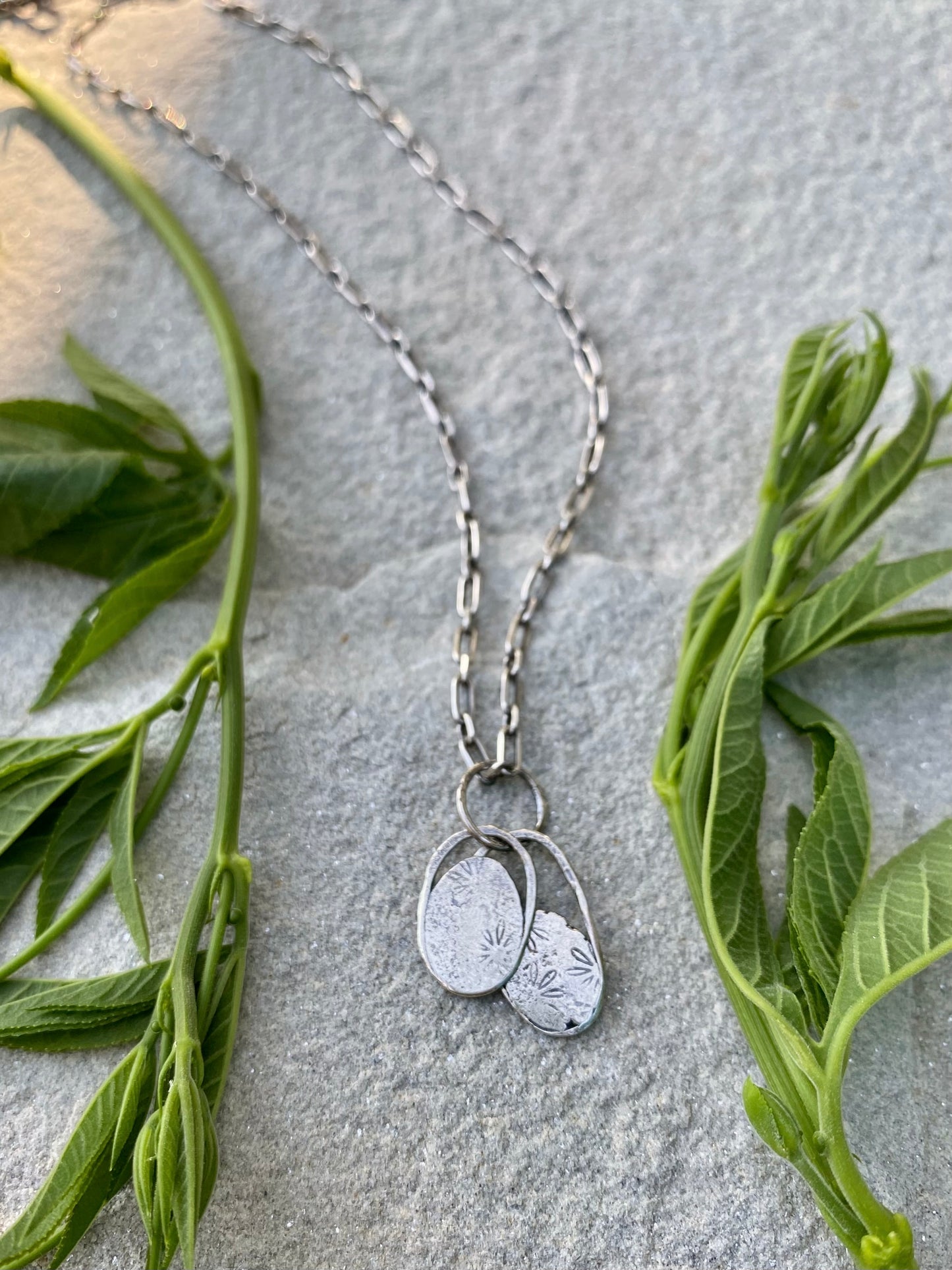 layered flower pendant