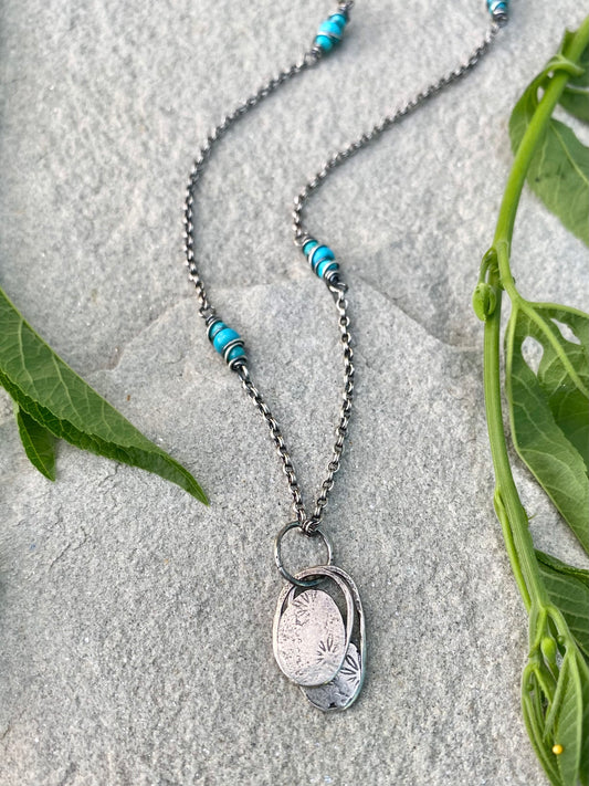 layered flower pendant