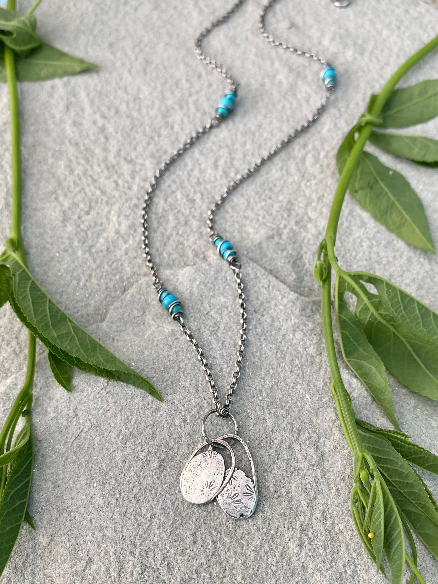 layered flower pendant
