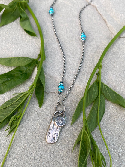 layered silver pendant