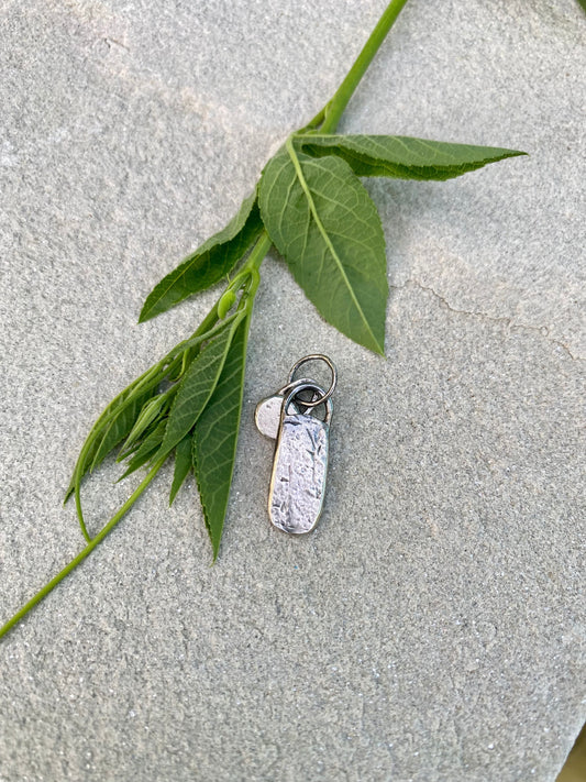 layered silver pendant