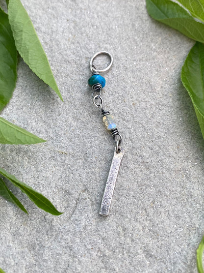 short wavy gem pendant