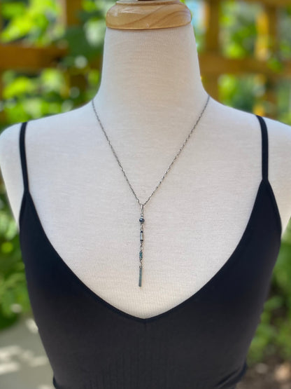 long wavy gem pendant