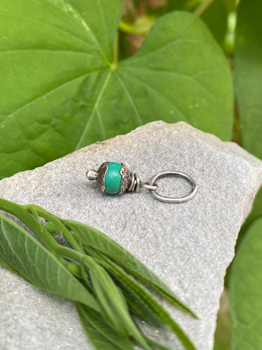 green turquoise tiny orb