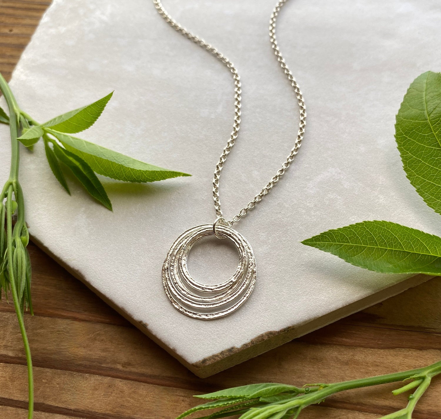 7 Circle 70th Minimalist Milestone Birthday Necklace, Sterling Silver 7 Rings Seven Decades Handcrafted Perfectly Imperfect Circle Pendant