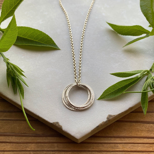 Four Circle 40th Milestone Minimalist Birthday Necklace, Sterling Silver 4 Rings for 4 Decades Handcrafted Perfectly Imperfect Pendant