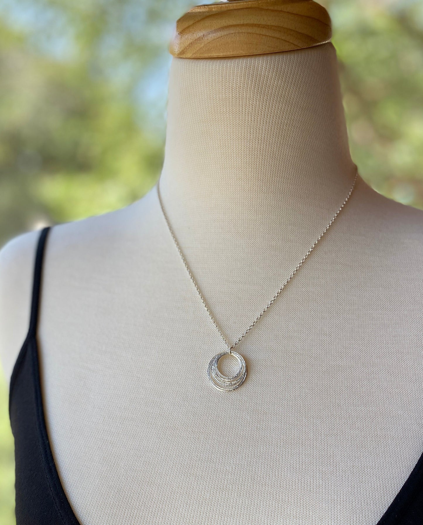 7 Circle 70th Minimalist Milestone Birthday Necklace, Sterling Silver 7 Rings Seven Decades Handcrafted Perfectly Imperfect Circle Pendant